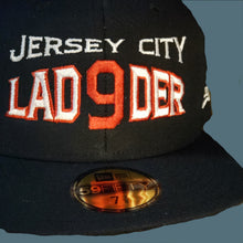 Load image into Gallery viewer, NEW Era 9FIFTY DEEP NAVY SNAPBACK w/ CITY OUTLINED front embroidery
